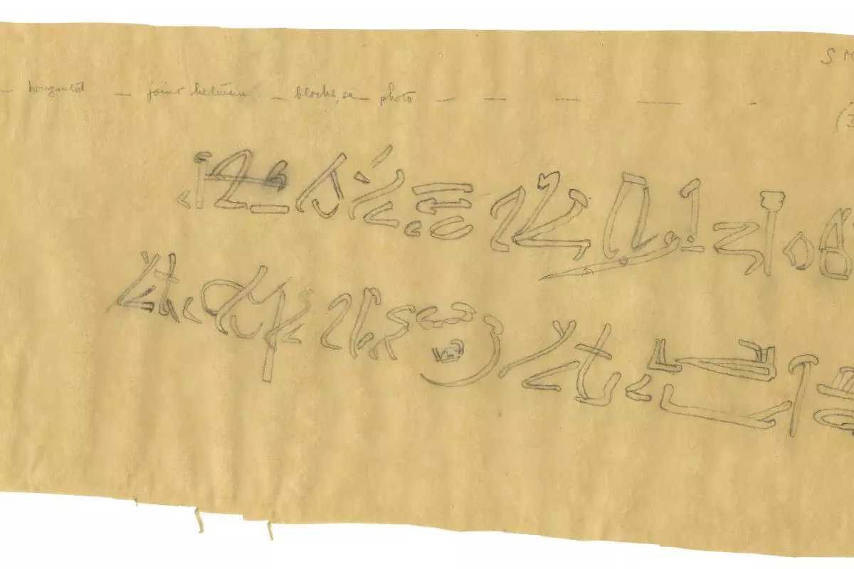 Epigraphy project. Shows pencil writing on a scrap of yellowed paper.